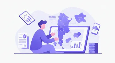 Escritorio de oficina con gráficos de distribución porcentual entre distintas regiones sobre una notebook, representando el reparto de ingresos brutos entre jurisdicciones